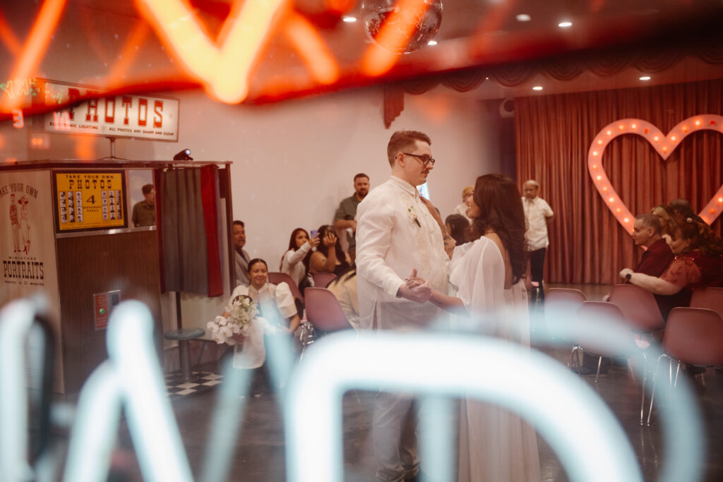 Couple having their first dance at Sure Thing Chapel in downtown Las Vegas during intimate elopement ceremony